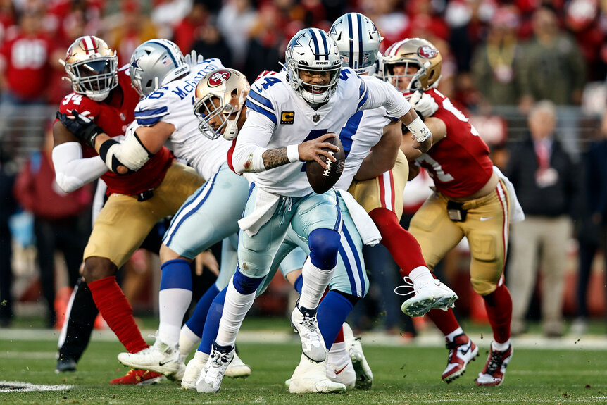 Protège dent foot US porté par un quarterback des Dallas Cowboys lors d'un match de football américain NFL